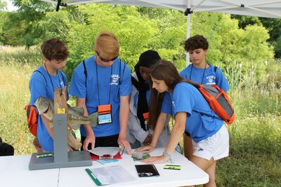 Ohio students collaborate to complete an environmental module.