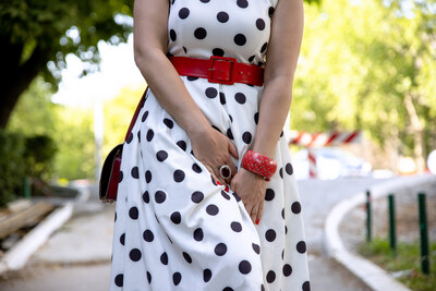 Well dressed woman experiencing urge to urinate. Credit: Biserka Stojanovic.