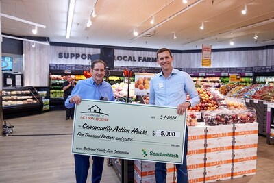SpartanNash presented local nonprofit Community Action House with a check for $5,000 to celebrate the grand reopening of the revamped Family Fare store.