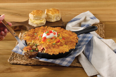 New Hashbrown Casserole Shepherd's Pie includes slow-simmered pot roast in a savory sauce with carrots, peas and mashed potatoes topped with a griddled hashbrown casserole crust and sour cream. Served with a choice of hand-rolled buttermilk biscuits or corn muffins.