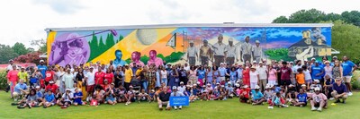 Leaders from across Greensboro, as well as First Tee – Central Carolina, join Wyndham executives and tournament officials following the unveiling of artist Vincent Ballentine’s commemorative mural honoring civil rights pioneers, The Greensboro Six. The mural is located at historic Gillespie Golf Course, which today serves as the headquarters for First Tee – Central Carolina.