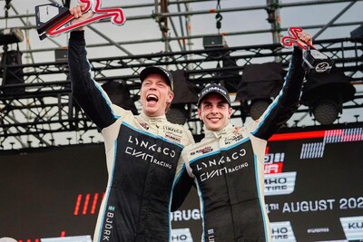 Lynk & Co Cyan Racing team celebrating their double wins at the 2024 TCR World Tour in Uruguay.
