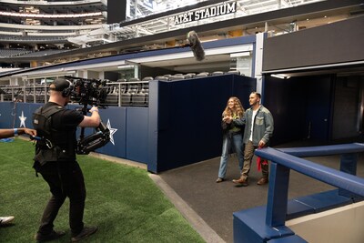 Alexa PenaVega and Carlos PenaVega walking through the tunnel while filming their premiere holiday movie at iconic AT&T Stadium in Arlington, TX. “Love At the Kettle” has its World Premiere in November exclusively on Great American Family.