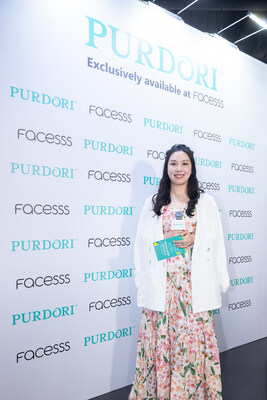 Purdori Founder Sylvia Leung celebrates the opening of the Purdori enclave at Facesss Times Square Hong Kong.