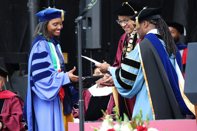 Morehouse College President David A. Thomas, Ph.D., (middle) and Provost Kendrick Brown, Ph.D., (right) present Adria Welcher, Ph.D., chair of the Sociology Department, (left) with the prestigious Vulcan Materials Company Teaching Excellence Award at Morehouse's Commencement in May. National recipients of this award are recognized for their dedication to teaching, ability to inspire students, and contributions to the academic community.
