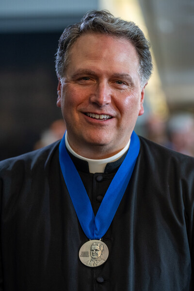 Father Chad Wilhelm, a priest of the Diocese of Fargo, N.D., received the Blessed Michael McGivney Medal during an awards session prior to the 142nd Supreme Convention in Québec City on Aug. 5, 2024. The medal is given annually since 2022 to recognize exemplary Knights of Columbus chaplains. Father Wilhelm has served as Knights of Columbus state chaplain of North Dakota for 27 years. (Photo by Tamino Petelinsek)