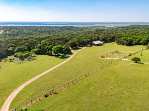 Impossibly close to Dallas, one elegant farm offers 120+ acres of peace, a pond, luxury living and Instagram-worthy views -- including of where the Cowboys and Rangers play