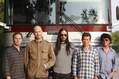 The Tragically Hip in front of tour bus, (circa late 2000s) Photographer: Gord Hawkins (CNW Group/Amazon Canada)