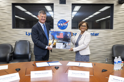 Giovanni Cristofoli, SVP of bp Solutions, and Vanessa Wyche, Director of NASA's Johnson Space Center, sign a Space Act Agreement between bp and NASA on Wednesday, August 7, 2024.