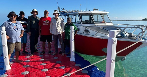 Figure 1. Adyton team ready to depart from New Ireland to go to Feni Island. Team from L to R: Skarty Furuga (Senior Geologist), Chris Wamugl (Senior Geologist), Tim Crossley (CEO), The Hon. Walter Schnaubelt (Namatanai MP and Minister for Aviation), Dr Chris Bowden (COO), support crew. (CNW Group/Adyton Resources Corporation) Figure 1. Adyton team ready to depart from New Ireland to go to Feni Island. Team from L to R: Skarty Furuga (Senior Geologist), Chris Wamugl (Senior Geologist), Tim Crossley (CEO), The Hon. Walter Schnaubelt (Namatanai MP and Minister for Aviation), Dr Chris Bowden (COO), support crew. (CNW Group/Adyton Resources Corporation)