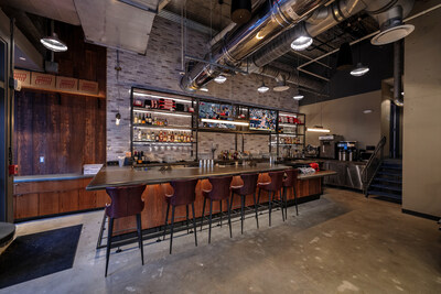 One bar featuring premium furniture & multiple tv's.