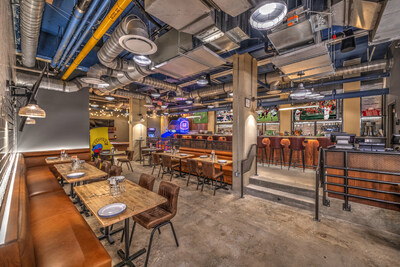 The larger bar featuring a modern, inviting design