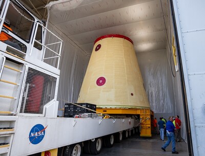 Crews are preparing to move a key adapter for NASA’s Space Launch System rocket out of Marshall Space Flight Center’s Building 4708 to the agency’s Pegasus barge. The cone-shaped launch vehicle stage adapter connects the rocket’s core stage to the upper stage and helps protect the upper stage’s engine that will help propel the Artemis II mission around the Moon. Credits: Sam Lott/NASA