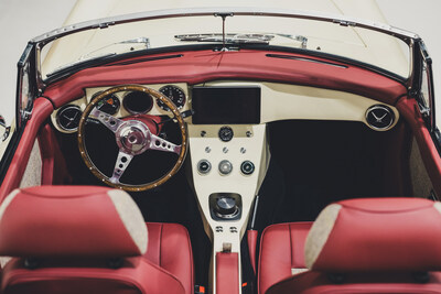 The interior of the new left-hand drive RBW EV Cars' Roadster is produced entirely in-house. From supple, hand-stitched leather seats to bespoke dash trims, RBW can tailor each car's interior based on the customer's preferences. Modern tech features include Apple Car Play and Android Auto, a 9” Pioneer touchscreen multimedia player, satellite navigation, etc. (PRNewsfoto/RBW EV Cars)