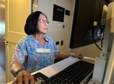 Amy Jirat, a mammogram tech for Alinea Medical Imaging, assists with patient testing on Aug. 6 at IEHP’s Community Wellness Center in Riverside.