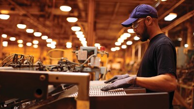 An employee at PLP's Albemarle, North Carolina manufacturing facility prepares dead-ends for cabling and forming operations.