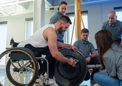 Team Bridgestone athlete Aaron Pike working with Bridgestone engineers.