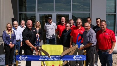 Members of the Ollie's team and Princeton city officials celebrate the ribbon cutting of the new Princeton distribution center in Illinois