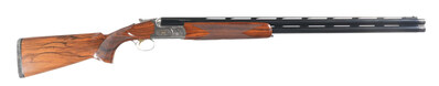 Caesar Guerini Summit 12-gauge over/under shotgun with 10mm vent rib and factory Maxis Choke system. Single selective adjustable trigger with ejector. Engraved coin-finished receiver signed 'Bottega Giovanelli.' Varnished, highly-figured checkered walnut stocks. Mechanically and aesthetically excellent. Comes in factory luggage case with 8 extended chokes, trigger wrench. Estimate: $3,000-$4,500 Caesar Guerini Summit 12-gauge over/under shotgun with 10mm vent rib and factory Maxis Choke system. Single selective adjustable trigger with ejector. Engraved coin-finished receiver signed 'Bottega Giovanelli.' Varnished, highly-figured checkered walnut stocks. Mechanically and aesthetically excellent. Comes in factory luggage case with 8 extended chokes, trigger wrench. Estimate: $3,000-$4,500