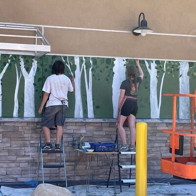 Several students from the recent “Talisman of the Watershed” workshop series, funded by a California Creative Corps grant and taught in partnership with local artist Troy Corliss, have been assisting with elements of the mural, which began on August 5, 2024.