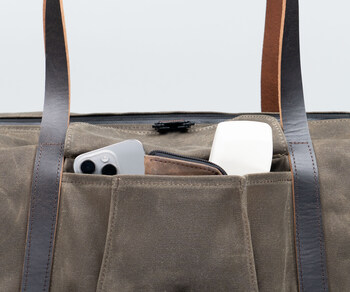 Expandable front pocket holds whatever items need to be accessed quickly