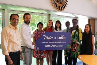 Jean-Philippe Laborde, Managing Director of Tilda present a donation to the LOVO founder, Ola Olive Stephen and the volunteer team.