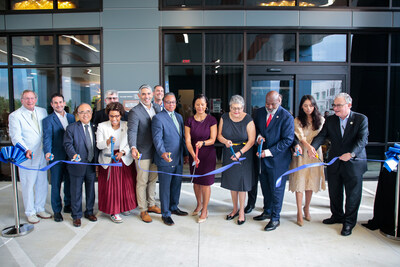 Public officials and project stakeholders from HHA, Columbia Residential, the City of Houston, the Texas GLO, HUD, Citigroup, and the National Equity Fund gather to commemorate the grand re-opening of 2100 Memorial during a ribbon-cutting ceremony on Aug. 29, 2024.