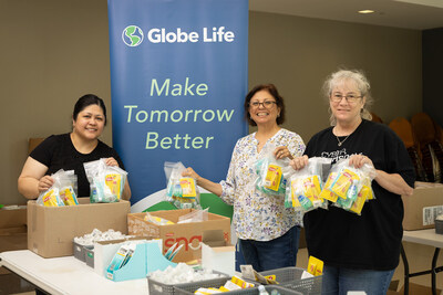 Globe Life home office employee engagement making care kits for our Military and First Responders.