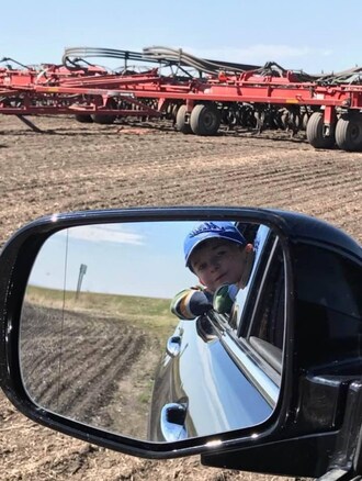 We are a farm family living in a small community, and we all work together to make our community a better place for our youth. Family is the core of any farm. We are a fifth-generation farm, and the kids are always excited when they get to ride along and work with their dad and grandpa. This picture represents the future, not only of our farm but our community. Eagerly waiting his turn to ride in the tractor and take part in seeding our next crop. Shelly Brunel (CNW Group/Lallemand Plant Care)