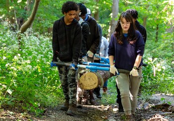 Student volunteers at Riverview Park in Pittsburg, PA, help remove dead trees and brush during a National Public Lands Day event in 2022. Photo by Alan Baldi.