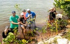 Volunteers at Jupiter Inlet Lighthouse Outstanding Natural Area in Florida help plant mangroves during a National Public Lands Day event in 2022. Photo by Paul Marino Photography.