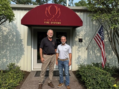 Kirk Humbrecht, Owner and President at Phoenix Fire, with Chuck Reimel, Pye-Barker's Vice President of Business Development.