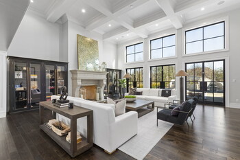 Living room with floor to ceiling windows