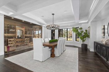 Dining room with glass front wine room