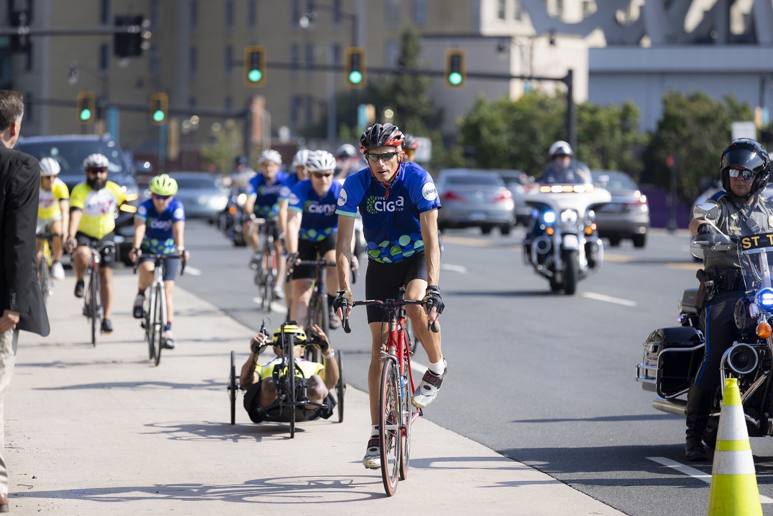 Cigna Chairman and CEO David Cordani leads a bike ride to Hartford, Conn.’s Dunkin’ Park.