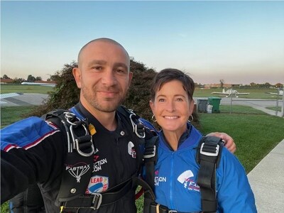 US Army Veteran and two-time Purple Heart Recipient Pasha Palanker with PenFed Credit Union EVP Talent/Risk/Infosec/Data Maura Watson before a jump in remembrance of 9/11 at The PenFed Foundation Military Heroes Golf Classic.