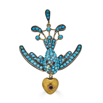 Low karat Victorian Era Turquoise and Garnet Bird Pendant. Image courtesy of KIL N.Y.C.