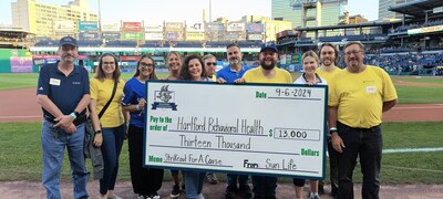 Sun Life and the Yard Goats present $13,000 donation to Hartford Behavioral Health.