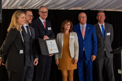 Dr. Oetker executives Valery Henle, Dino Koundoutsikos, Christian Von Twickel and Josh Van Bladel were joined by Robert Flack, Ontario Minister of Farming, Agriculture, and Agribusiness and Teresa Armstrong, MPP for London-Fanshawe, at a Sept. 12 event in London, Ont. to commemorate the tenth anniversary of Dr. Oetker's frozen pizza plant in London. (CNW Group/Dr.Oetkar)