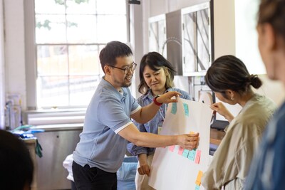 Hyundai Motor Group designers and engineers working with faculty and staff in RISD's Edna W. Lawrence Nature Lab in August 2024 (photo credit: Jo Sittenfeld).