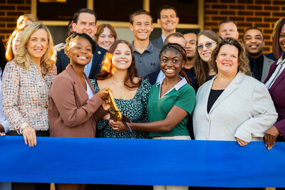 Students from North Stafford High School join legislative guests and school representatives to celebrate the ribbon-cutting of their 1.8 MW rooftop solar array.