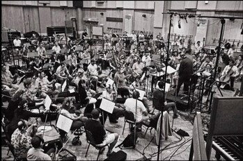 Tolga Kashif directing the Royal Philharmonic Orchestra at Abbey Road Studios, London