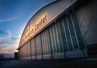 The Sun rises above the Flight Research Building at NASA’s Glenn Research Center in Cleveland.