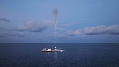 Space Perspective's Spaceship Neptune-Excelsior capsule is lifted by the SpaceBalloon™ from the deck of MS Voyager, embarking on a historic test flight.