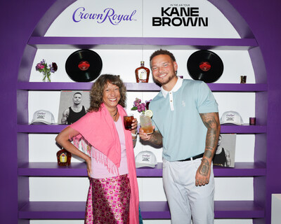 Kane Brown is joined by the “That Deserves a Crown with Kane Brown” sweepstakes winner.