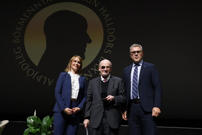 Salman Rushdie is awarded the 2024 Halldór Laxness International Literary Prize at a ceremony in Reykjavík, Iceland, on September 13, 2024, with Prime Minister of Iceland, Bjarni Benediktsson, and Director of the Reykjavík International Literary Festival and chairman of the selection committee, Stella Soffía Jóhannesdóttir.