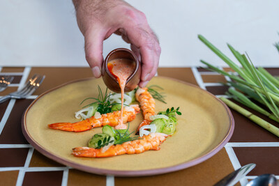 Seasonal Lemongrass Panna Cotta & Prawn Dish. Photo credit: Bri Amato
