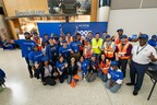 A group of United Airlines employees participating in the Rise Against Hunger Experience meal packaging event at George Bush Intercontinental Airport (IAH) on September 11, 2024.