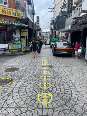 Curious Yellow Shield Pops Up Across The Streets of Seoul's Honda and Tawny Neighbourhoods