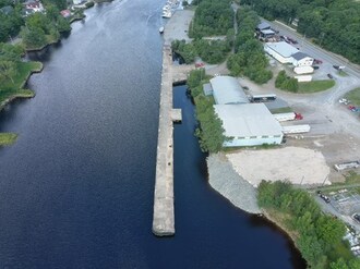 Photo caption: Aerial photo of the cleaned up wharf in Bridgewater where the three problem vessels were previously moored. (CNW Group/Canadian Coast Guard)